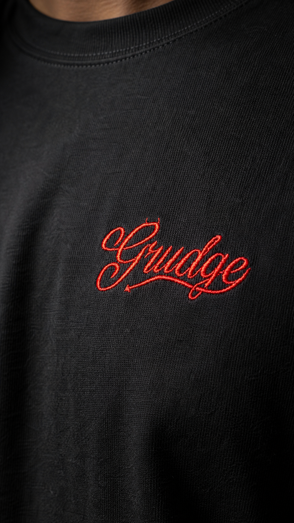Close-up of the red Grudge chest embroidery